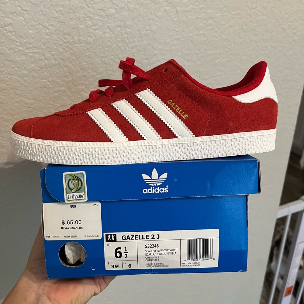 Adidas red Gazelle in youth 6.5.  Never worn. 6.5y is equivalent to women’s 8